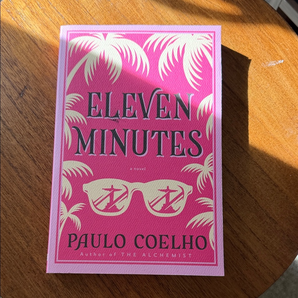 Paulo Coelho Paperback with Pink Cover Accents